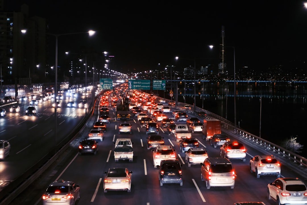 How does adaptive cruise control work in traffic?